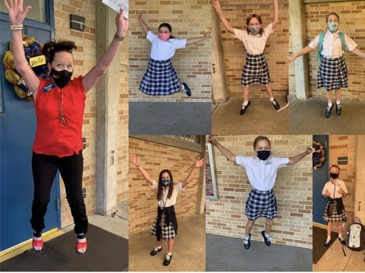 Students jump for joy at winning a temperature kiosk